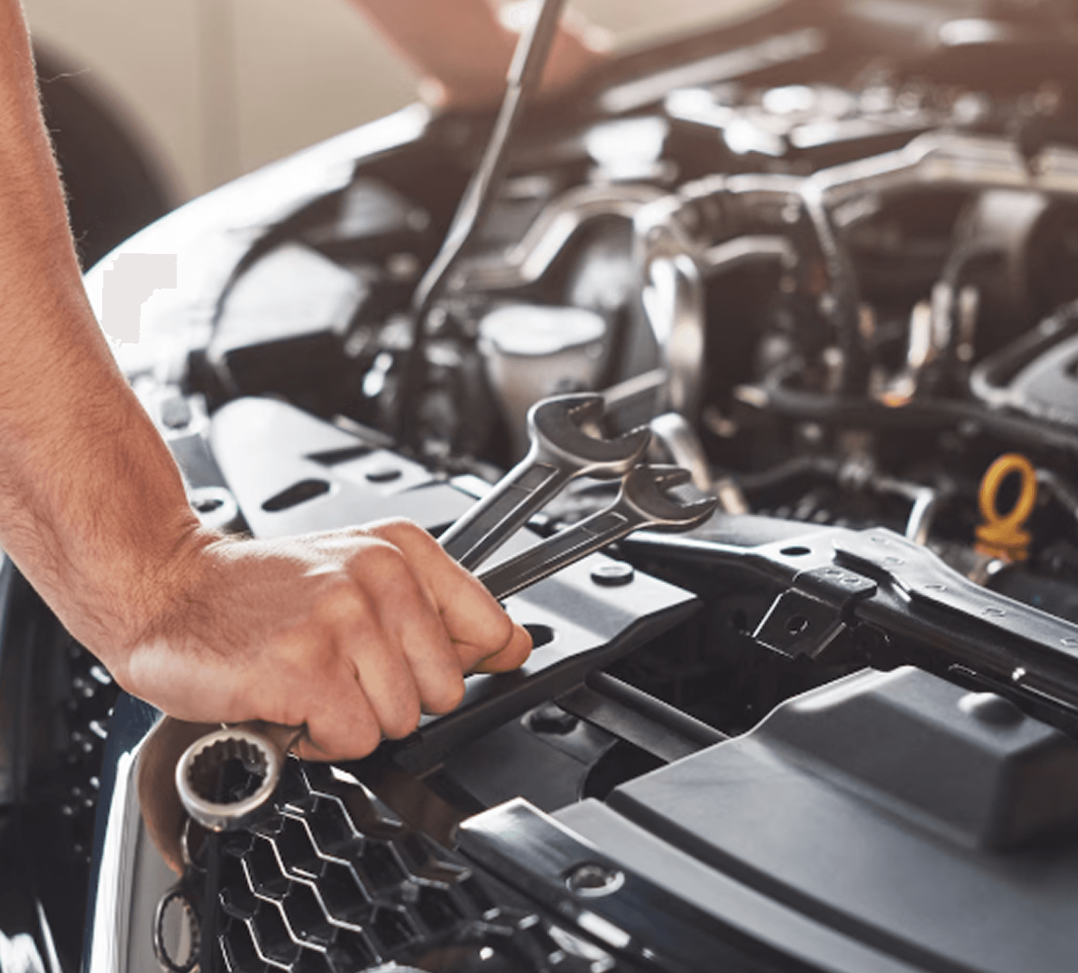 Two cars on display at a dealership